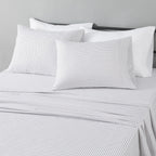 Amazon Basics Lightweight Super Soft Breathable Wrinkle-Resistant Microfiber 4-Piece Bed Sheet Set with 14-Inch Deep Pockets, Queen, Bright White, Solid